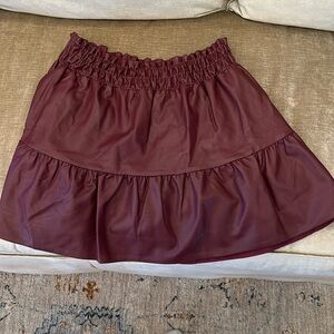Anthropologie Somerset Mini Skirt - wine pleather. 100 percent Viscose.
